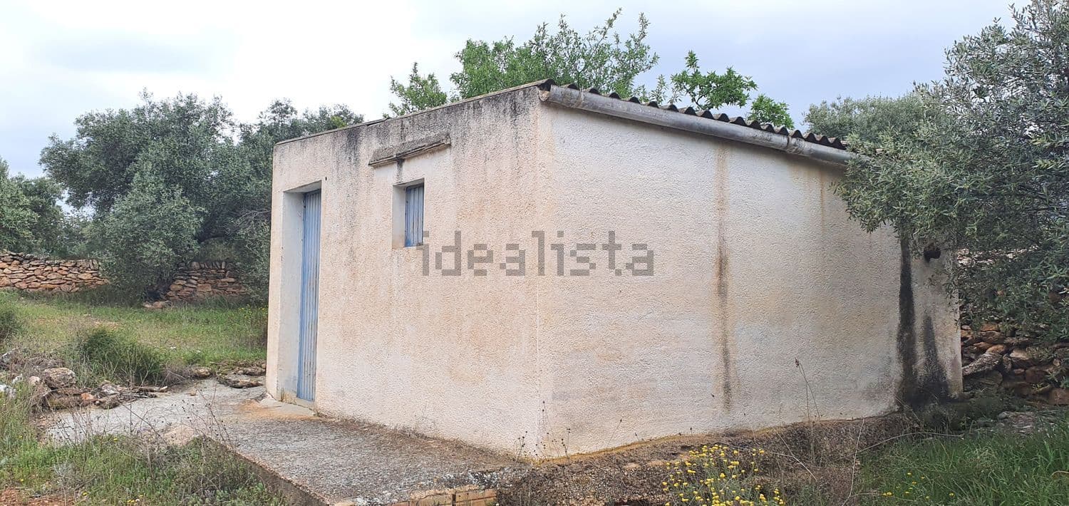Casa de campo de una planta vista de lado