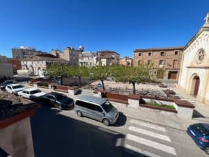 Vistas a la plaza y a la iglesia desde la terraza