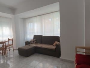 Salón con sofá chaise longue