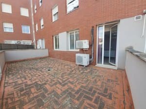 Terraza con suelo de ladrillo