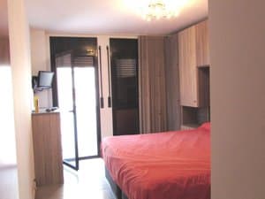 Dormitorio principal con salida al balcón