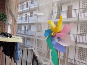 Galería con tendedero y vistas al patio