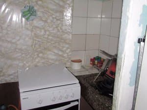 Cocina de gas junto a la pared